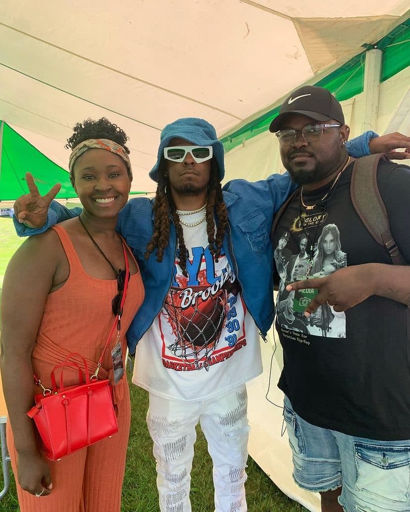 Glory in the Beat with artists in a festival tent.