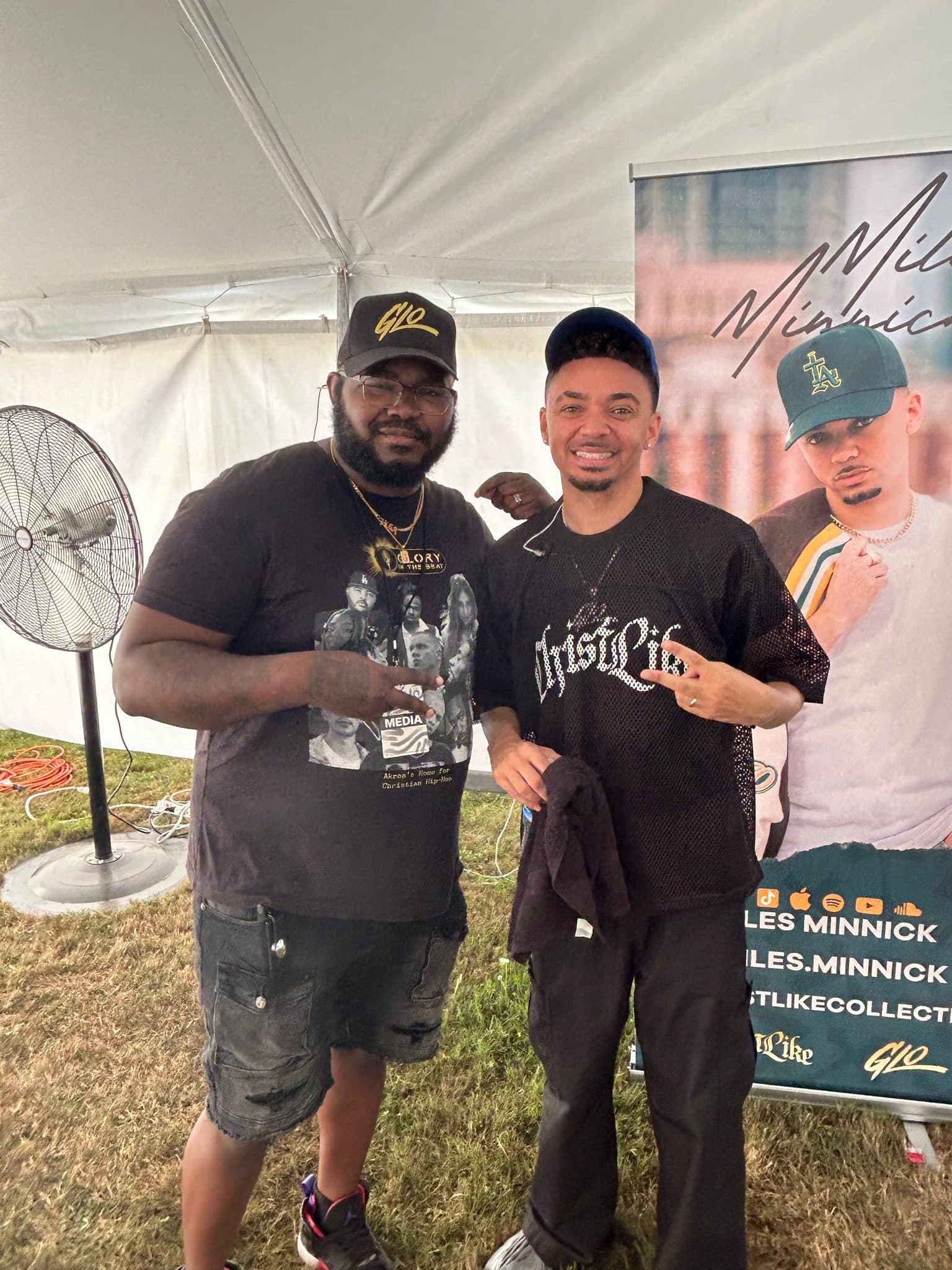 Glory in the Beat with an artist in a festival tent.
